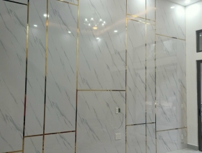 HOÀN THIỆN THI CÔNG ỐP TƯỜNG PHÒNG KHÁCH TẠI TÂN UYÊN - BÌNH DƯƠNG